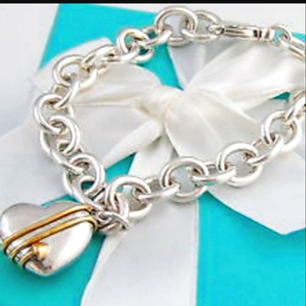 18KT Gold Cupid Tiffany Solid Sterling Heart 7.5"  45.05gms. Total Aggre…